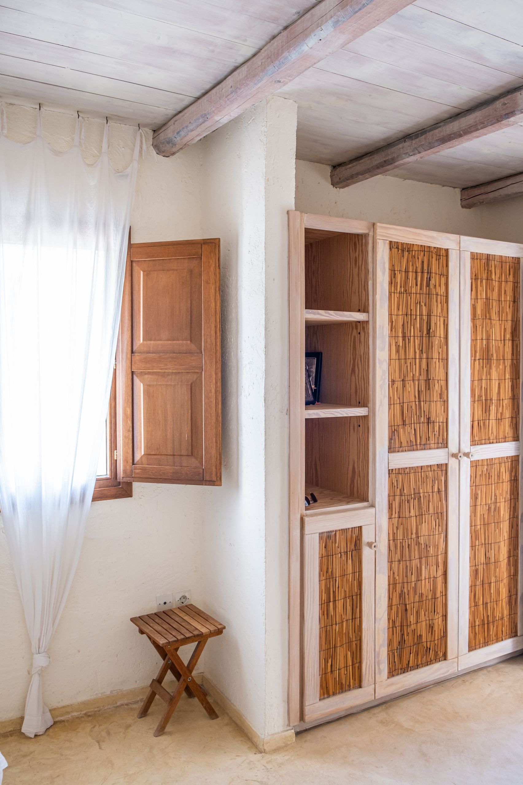 Master bedroom detail with traditional furnishings